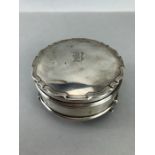 Silver trinket box, hallmarked Birmingham 1919, on three legs, approx diameter 19cm, gross weight