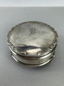 Silver trinket box, hallmarked Birmingham 1919, on three legs, approx diameter 19cm, gross weight