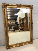 Large oblong gilt-framed bevel-edged mirror, approx 107cm x 75cm