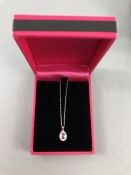 18CT W/G pink sapphire and diamond pendant of 60 points