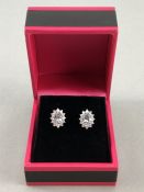 Pair of 18ct w/g diamond and acqamarine stud earrings 1.3ct's