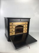 Ebonised drop front writing box with two hidden drawers Approx 44cm x 29cm x 35cm tall