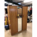 Mid Century two door wardrobe with long mirror to centre and hanging rail, approx 121cm x 55cm x