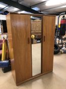 Mid Century two door wardrobe with long mirror to centre and hanging rail, approx 121cm x 55cm x