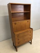 Mid Century tall sideboard with three drawers under, two shelves and drop fronted cupboard over by