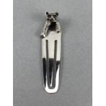 A slicer bookmark with cat finial
