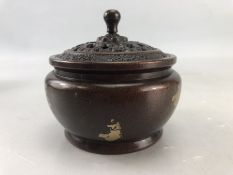 Bronze censer with pierced lid and gold splash design, impressed mark to base, approx 10cm in