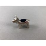 Silver dog pincushion