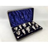 Sixteen piece boxed set of hallmarked silver cruet set with blue glass liners (salts and