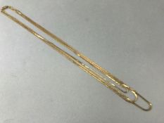 9ct Gold triple necklace, approx 22g in weight