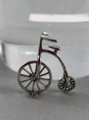 Silver figure of a penny farthing
