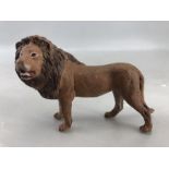 Small cold painted bronze of a lion, approx 10cm in length