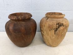 Two large rustic carved wooden vases, approx 40cm tall