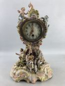 Large Ceramic ornate clock with Cherubs, blue makers mark to base (approx 40cm tall)