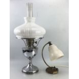 Famos chrome oil lamp with white glass shade and original chimney along with a 1930s small desk