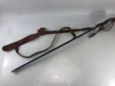 Cavalry sword or sabre with metal scabbard and John Jones and Co leather strap with acorn metal