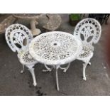 White metal small round garden table with two chairs