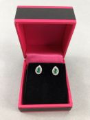 Pair of 18CT W/G emerald and diamond pear shaped earrings 65 points