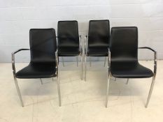 Set of four 1980s Danish dining chairs by Actona with chrome legs and black leather seats