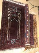 Collection of four Eastern / Oriental rugs, largest approx 150cm x 80cm