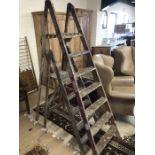 Two vintage decorators ladders, the tallest approx 6ft