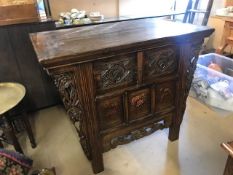 Eastern style chest with carved drawers and hand painted floral panels, carved flower detailing to