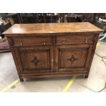 Oak dresser base with two drawers and two cupboards, approx 138cm x 54cm x 97cm tall