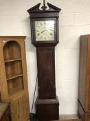 Long case clock, face with green floral sprays on a cream background, signed Thos. Bates