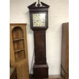 Long case clock, face with green floral sprays on a cream background, signed Thos. Bates