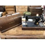 Cased Singer sewing machine with original Singer cardboard box and accessories, serial no. Y1625979