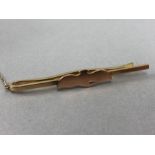 Hallmarked 9ct Gold tie Pin with a bird motif and safety chain total weight approx 7.3g