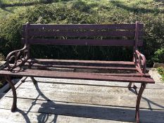 Garden bench with wrought iron ends
