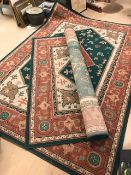 Pair of large green ground rugs, each approx 270cm x 190cm