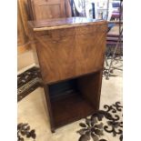 Side table with lid opening to reveal a sewing box