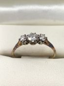 Three stone Diamond ring on Platinum and rose gold size 'Q' in vintage leather presentation box