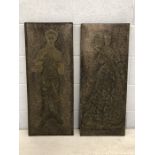 Two brass figures mounted on panels depicting medieval characters, each approx 85cm x 35cm