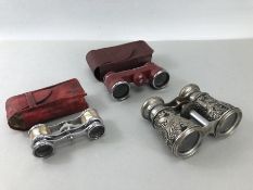 Three pairs of binoculars/ opera glasses to include a pair of red BRAUN Nurnberg