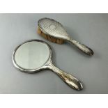 Hallmarked Silver dressing table set comprising of a silver backed Mirror and brush both by E S