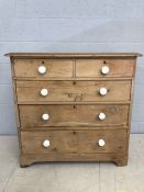 Antique pine chest of five drawers with ceramic handles, approx 99cm x 48cm x 97cm tall