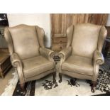 Pair of fawn wing backed modern armchairs by maker Sherborne