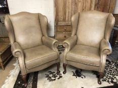 Pair of fawn wing backed modern armchairs by maker Sherborne