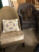 Two wicker Lloyd Loom style chairs: one armchair, one nursing chair