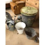 A good collection of galvanised metal items to include watering cans, coal scuttle, animal feeder