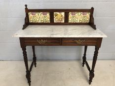 Marble topped washstand with floral tiled splashback, two drawers and turned legs (A/F)