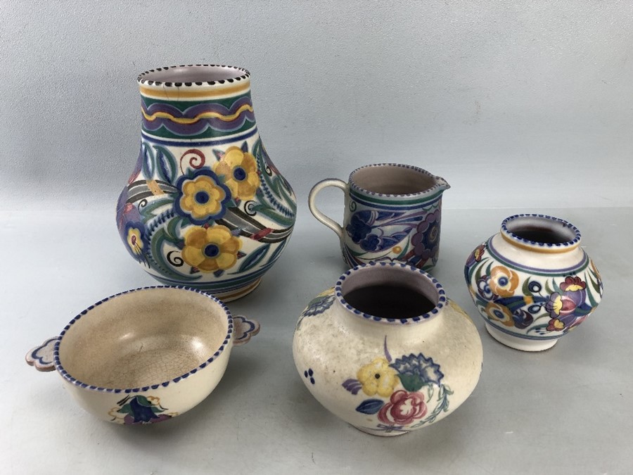 Five pieces of Poole pottery comprising three vases, jug and bowl. Includes XA design vase (approx