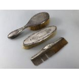 Birmingham Hallmarked Silver dressing table set two brushes and a comb (A/F)