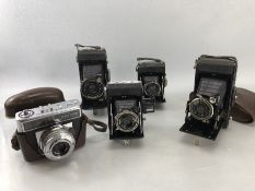 Collection of vintage cameras to include a Zeiss Icon Nettar 515/2 and case, 120mm roll camera, 10.