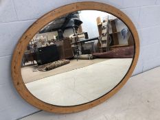 Very large pine framed oval mirror, approx 120cm x 95cm