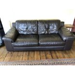 Two seater brown leather sofa, approx 208cm in length