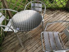 Metal garden table and three chairs